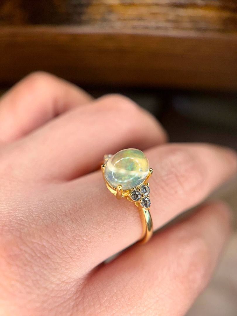 Natural Opal Gold-Plated Silver Ring (Category: Rings) located in Baguio. Submitted by asna_taku (Listing ID 1457048579, Image 2). Description: 🤍 Natural Opal Gold-Plated Silver Ring — ₱3,880 Soft, luminous and effortlessly elegant. ✨ Featuring a beautiful Natural Opal with a dreamy translucent body and subtle flashes of color, set in silver plated in gold with delicate sparkling accents. 💎 Natural Opal ✨ Silver plated in gold 💍 Sizes availabl