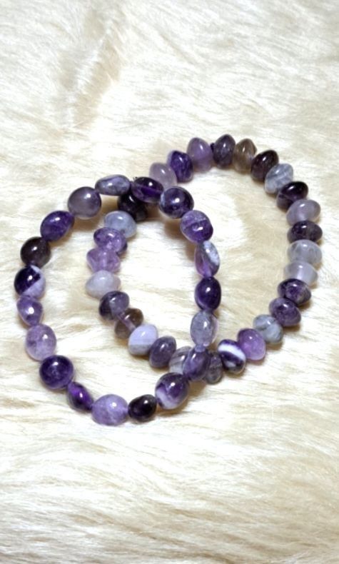 Natural Phantom Amethyst Crystal Bracelets - Healing Stones (Category: Bracelets) located in Quezon City. Submitted by crystallinehaven (Listing ID 1456955302, Image 2). Description: Natural Phantom Amethyst Crystal Bracelets - Healing Stones ♦️2 pcs available ♦️disc style beads p450 ♦️oval type beads p180 💥take all p550 PHANTOM AMETHYST with a mix of purple amethyst, milky/clear quartz and darker smoky-looking inclusions. Some beads show “ghost