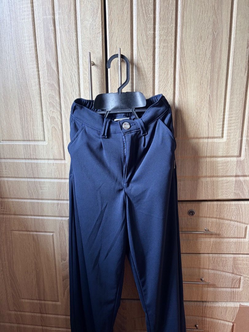 Navy Blue Wide Leg Pants (Category: Other Bottoms) located in Tanza. Submitted by kmoarse (Listing ID 1457083776, Image 1). Description: - Navy blue wide-leg pants - Elastic waistband with button and zip closure - Features functional pockets - Versatile for casual or dressed-up looks - Offers a comfortable fit - Used once.