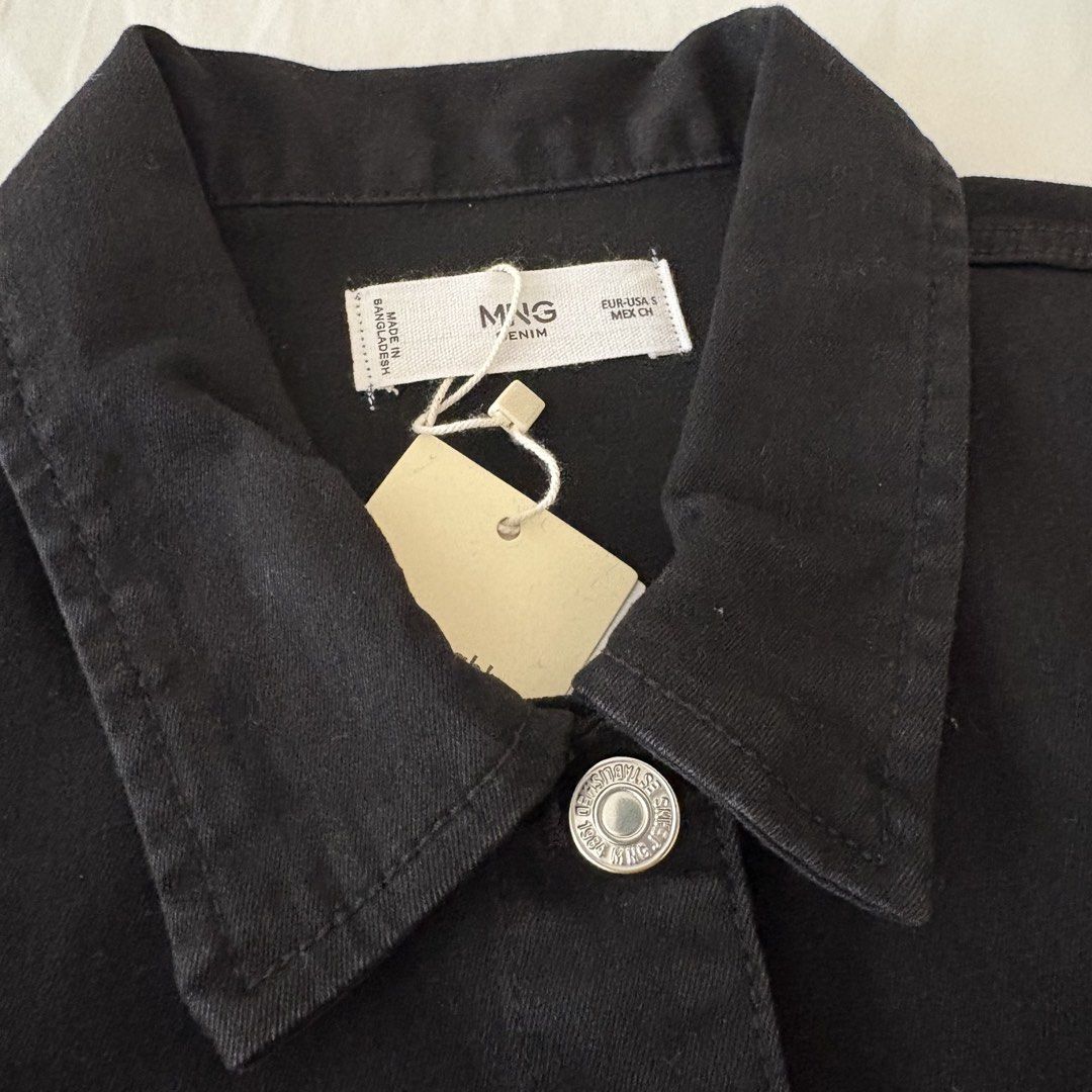 NEW Mango Black Denim Jacket (Category: Coats, Jackets and Outerwear) located in Quezon City. Submitted by _crackle_ (Listing ID 1456984867, Image 2). Description: - Brand new, never been used before - Was supposed to be given as a gift, thats why the price isn't on the tag - Purchased from ZALORA - No when worn photos, sorry.