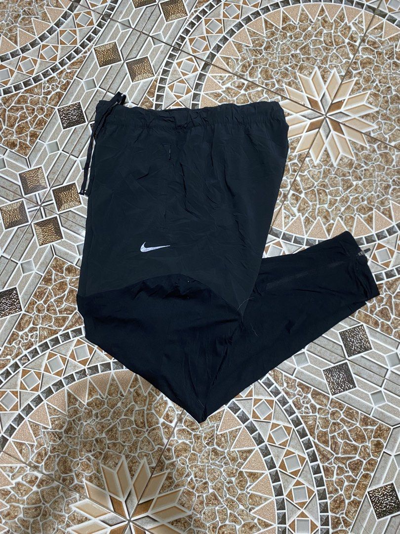 Nike Running Dri-FIT joggers (Black) (Category: Activewear) located in Cagayan de Oro. Submitted by r.twosix (Listing ID 1457057774, Image 3). Description: Nike Running Dri-FIT joggers in black Size : W30-32 L37 (Women’s XL) • Features: Elastic waistband with drawstring, ankle zippers • Ideal for: Workouts, running, casual wear Good Condition 💯 750 + sf 📍Cagayan de Oro City.