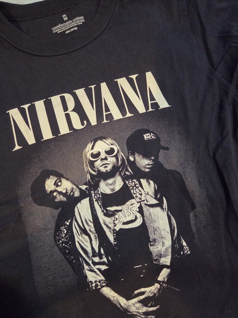 Nirvana Print Band Shirt (Category: Tshirts & Polo Shirts ) located in Taguig. Submitted by mightydept (Listing ID 1457065850, Image 2). Description: - Classic black Nirvana band t-shirt - Features band members graphic on the front - Made from 100% comfortable cotton - Size: Medium - Ideal for any Nirvana fan.