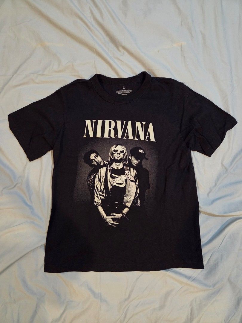 Nirvana Print Band Shirt (Category: Tshirts & Polo Shirts ) located in Taguig. Submitted by mightydept (Listing ID 1457065850, Image 1). Description: - Classic black Nirvana band t-shirt - Features band members graphic on the front - Made from 100% comfortable cotton - Size: Medium - Ideal for any Nirvana fan.