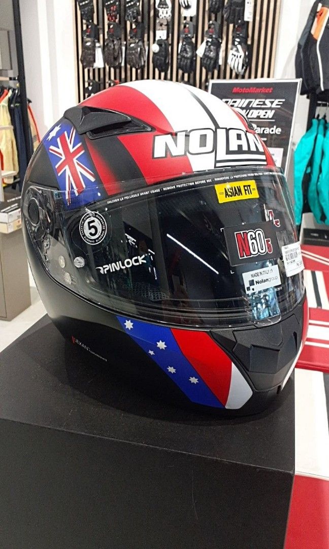 Nolan N60⁵ XL (Casey StonerTogether) (Category: Helmets and other Riding Gears) located in Antipolo. Submitted by jaysnake (Listing ID 1457001318, Image 2). Description: Nolan N60⁵ XL Casey Stoner together 27 MotoGp, Fullface solid Helmet,Single Visor,with dust bag & Box orig price 13k Motomarket.