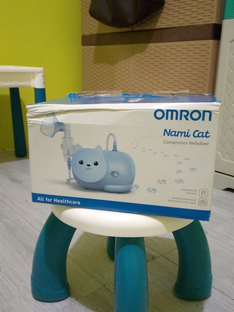 OMRON Nami Cat Compressor Nebulizer (Category: Medical Supplies & Tools) located in Taytay. Submitted by laine2023 (Listing ID 1457075705, Image 3). Description: - Cute OMRON Nami Cat compressor nebulizer - Ideal for children and the whole family - Efficient medication delivery to the lungs - MMAD: 3.4 µm - Nebulization rate: 0.35 ml/min - Medication tank capacity: 2-12 ml - Includes: compressor, nebulizer kit, child mask, adult mask, mouthpiece,