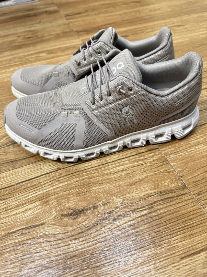 On Cloud Running Shoes Grey US Men 10 (Category: Sneakers) located in Manila. Submitted by joseica2911716 (Listing ID 1457097052, Image 2). Description: - On Cloud running shoes - Color: Neutral Grey - Size: US Men's 10 / UK 9.5 / EU 44 - Lightweight and comfortable - Perfect for everyday runs or casual wear - Features Swiss Engineering - Made in Indonesia - Ideal for an active lifestyle.