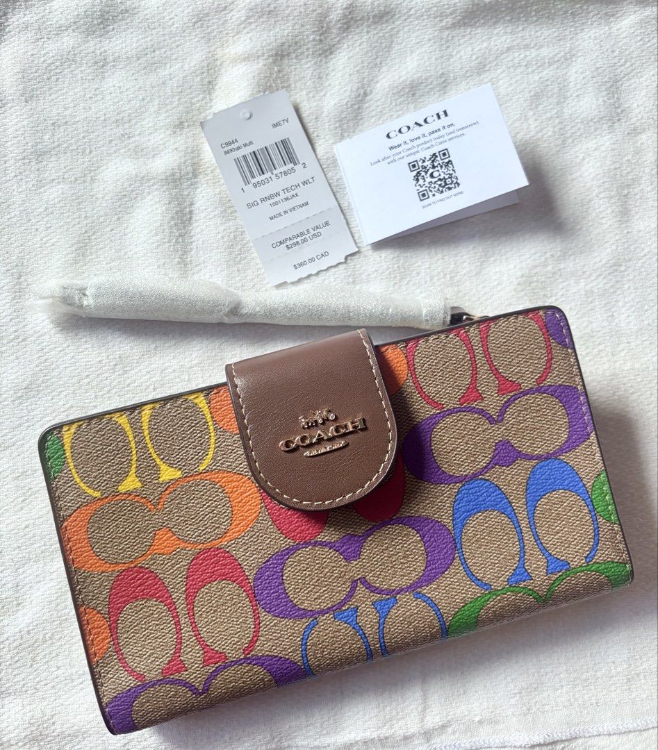ORIGINAL & IMPORTED Signature Rainbow TechWallet (Category: Wallets & Card holders) located in Malolos. Submitted by cheerz21 (Listing ID 1456989193, Image 1). Description: ORIGINAL & IMPORTED Signature Rainbow TechWallet -Signature Rainbow TechWallet -Brand new w/ issue 📌ISSUE: ngkaron lang po ng leather bubbles inside the wallet due to shipping (pls swipe photo for deets) -With tag and care card -Exact photos are posted No return, no exchange.