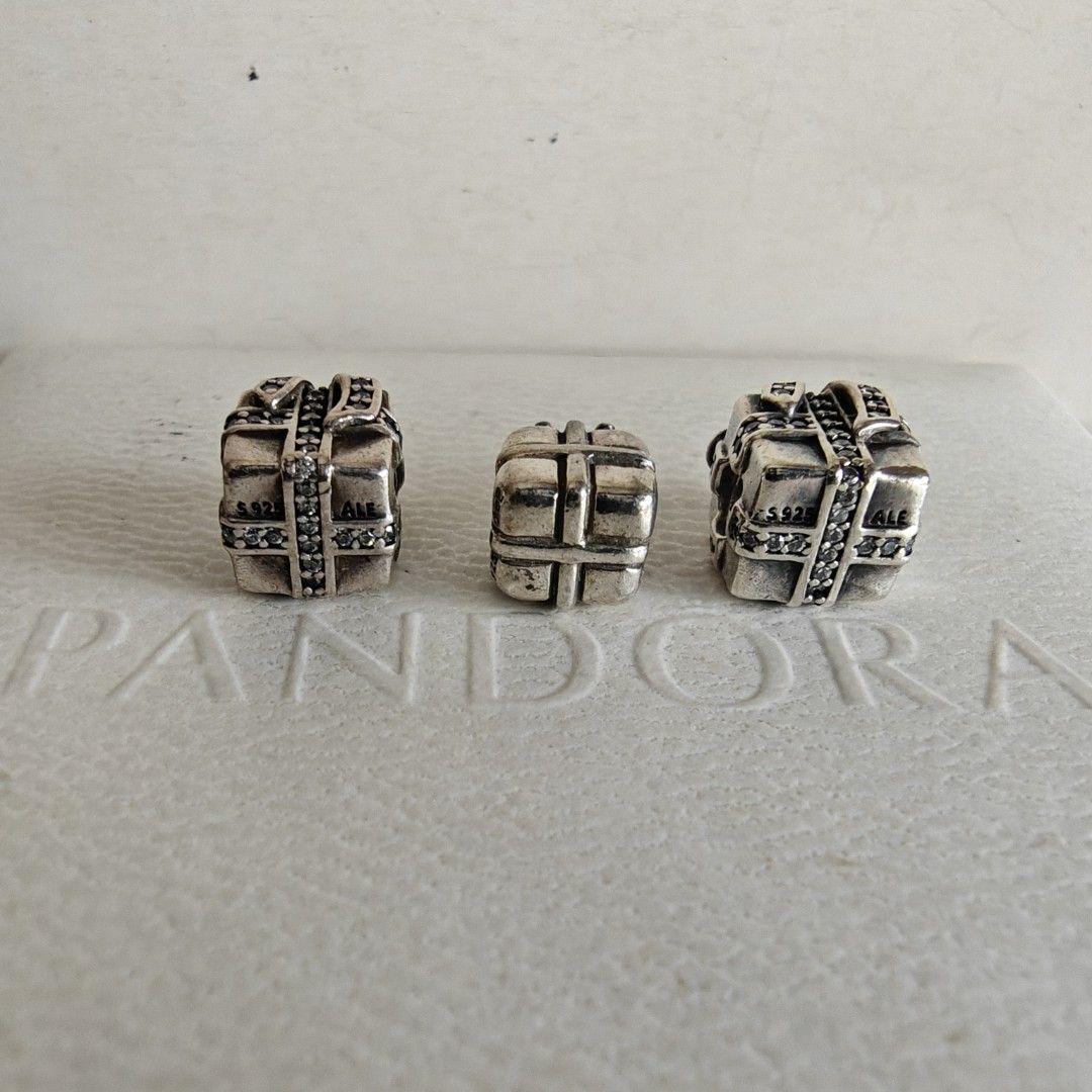 Pandora gift charm (Category: Charms) located in Makati City. Submitted by ly12eb (Listing ID 1456967243, Image 2). Description: Authentic Excellent condition Plain silver gift 1.3k Sparkling gift 1.65k.
