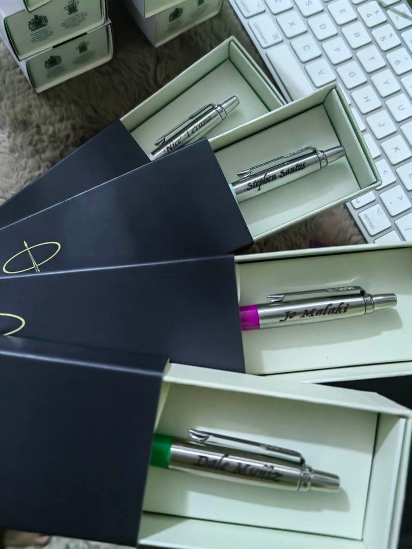 Parker Pens with Custom Engraving - Assorted Colors (Category: Stationery & School Supplies) located in Caloocan City. Submitted by addtojoyonlinestore (Listing ID 1457010900, Image 2). Description: - Personalized Parker Pens - Each pen engraved with a name - Available Colors: White, Light Blue, Yellow, Pink, Purple, Teal, Red, Dark Blue, Green, Magenta - Comes in individual gift boxes - Ideal for gifts or personal use.