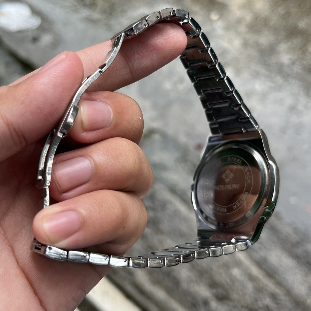 PATEK PHILIPPE NAUTILUS TIFFANY & CO (Category: Luxury Watches) located in Manila. Submitted by aihzenbalt91094 (Listing ID 1457086431, Image 3). Description: 40 MM WITH DATE AUTOMATIC DOUBLE LOCK HEAVY WATER RESIST WORKING EXCELLENT NO ISSUE CLAIM 2,000 WITH BOX.