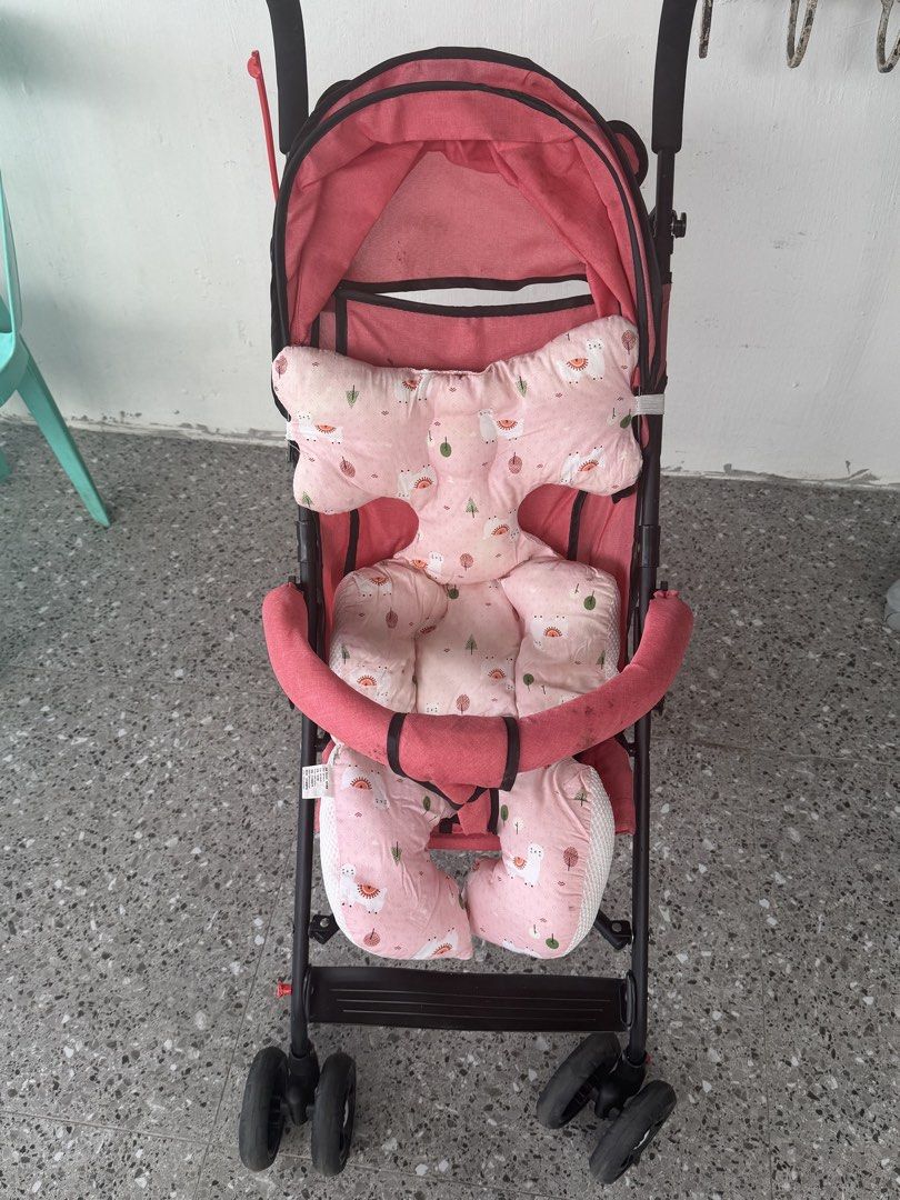 Pink Bear Baby Stroller (Category: Strollers) located in Bulacan. Submitted by carmela00 (Listing ID 1457075791, Image 2). Description: - Adorable pink stroller with a cute bear design on the canopy. - Free soft pad foam insert for your baby's comfort. - Lightweight and designed for easy folding, making it convenient for travel. - Ideal for daily walks and family outings. - Ready for its next adventure with a new family.