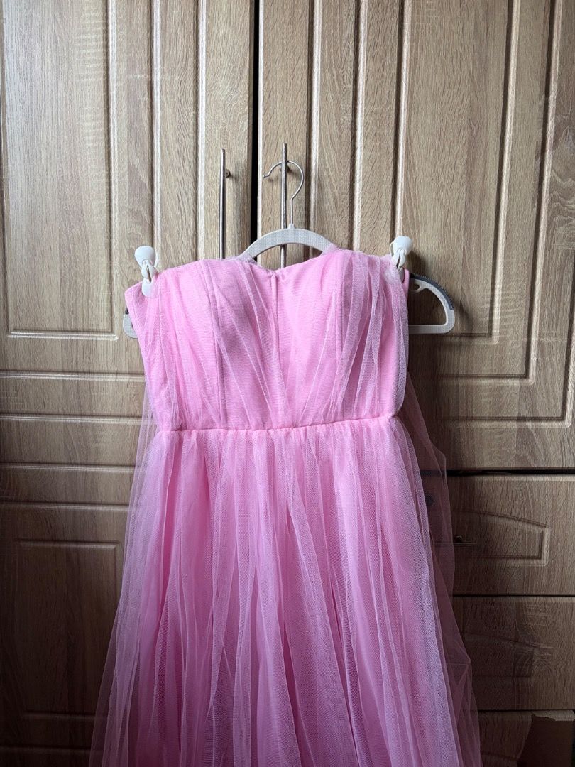 PINK CORSET TULLE MULTI-WAY DRESS (Category: Dresses) located in Tanza. Submitted by kmoarse (Listing ID 1456970485, Image 2). Description: - Pink corset tulle dress - Versatile for wedding or formal occasions - Easily pairs with heels - With 4 mesh sleeves - Used once.