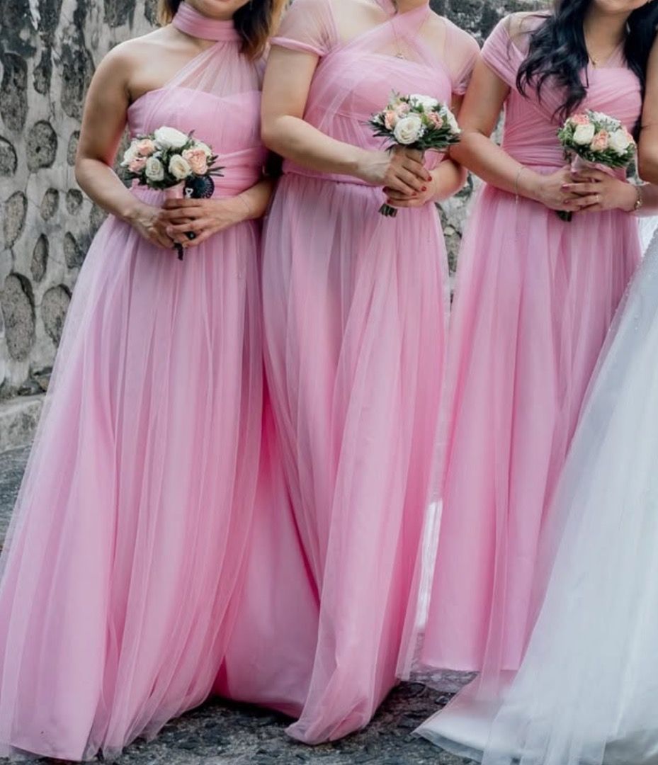 PINK CORSET TULLE MULTI-WAY DRESS (Category: Dresses) located in Tanza. Submitted by kmoarse (Listing ID 1456970485, Image 1). Description: - Pink corset tulle dress - Versatile for wedding or formal occasions - Easily pairs with heels - With 4 mesh sleeves - Used once.