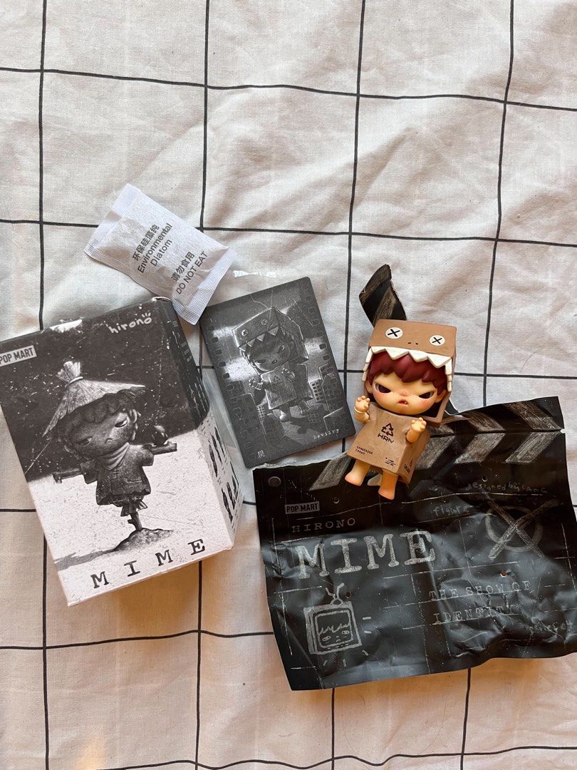 Pop Mart Hirono Mime Blind Box Figure (Category: Designer & Blind Box Toys) located in Carmona. Submitted by felize.abigail (Listing ID 1457067384, Image 2). Description: - Authentic Pop Mart Hirono Mime figure - Includes original box, inner packaging, and character card - Desiccant packet included - Ideal addition to any collection.