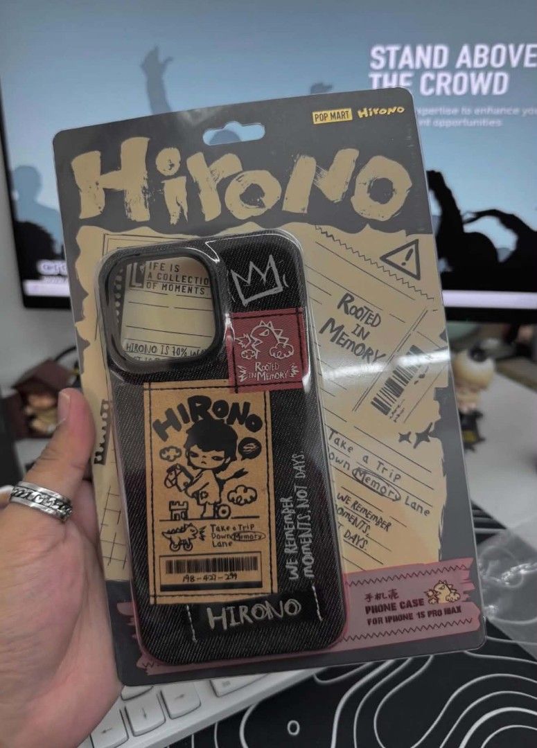Pop Mart Hirono Phone Case for iPhone 15 Pro Max (Category: Cases & Sleeves) located in San Jose del Monte. Submitted by zloradstvo (Listing ID 1457045991, Image 1). Description: - Pop Mart Hirono phone case - Compatible with iPhone 15 Pro Max - Features a cool Hirono character graphic design - Still in original packaging - Ideal for Hirono fans and unique phone accessory collectors.