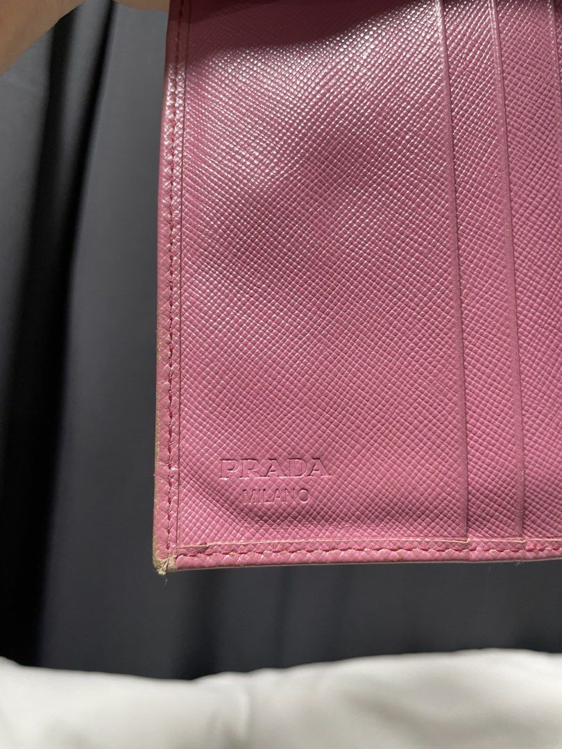 Prada Saffiano leather wallet pink (Category: Luxury Bags & Wallets) located in Davao. Submitted by lwky_thrift (Listing ID 1457132831, Image 3). Description: Prada Saffiano leather wallet pink Normal Sign of use only kindly check the attached photos Good Condition .