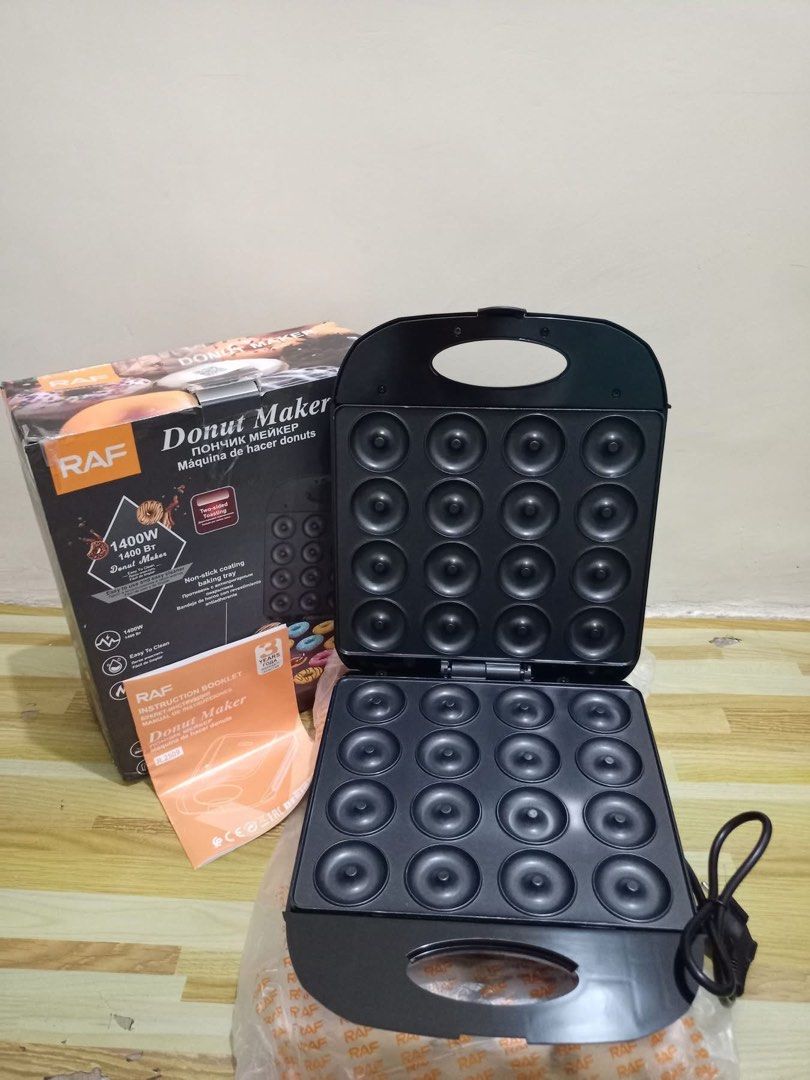 RAF 1400W Donut Maker (Category: Cookware & Accessories) located in Bulacan. Submitted by celinexxxbuyer (Listing ID 1457094718, Image 1). Description: - Brand new RAF donut maker - Makes 24 mini donuts at a time - Features a non-stick coating baking tray - Easy to use and clean - Comes with an instruction booklet - Perfect for quick homemade treats.