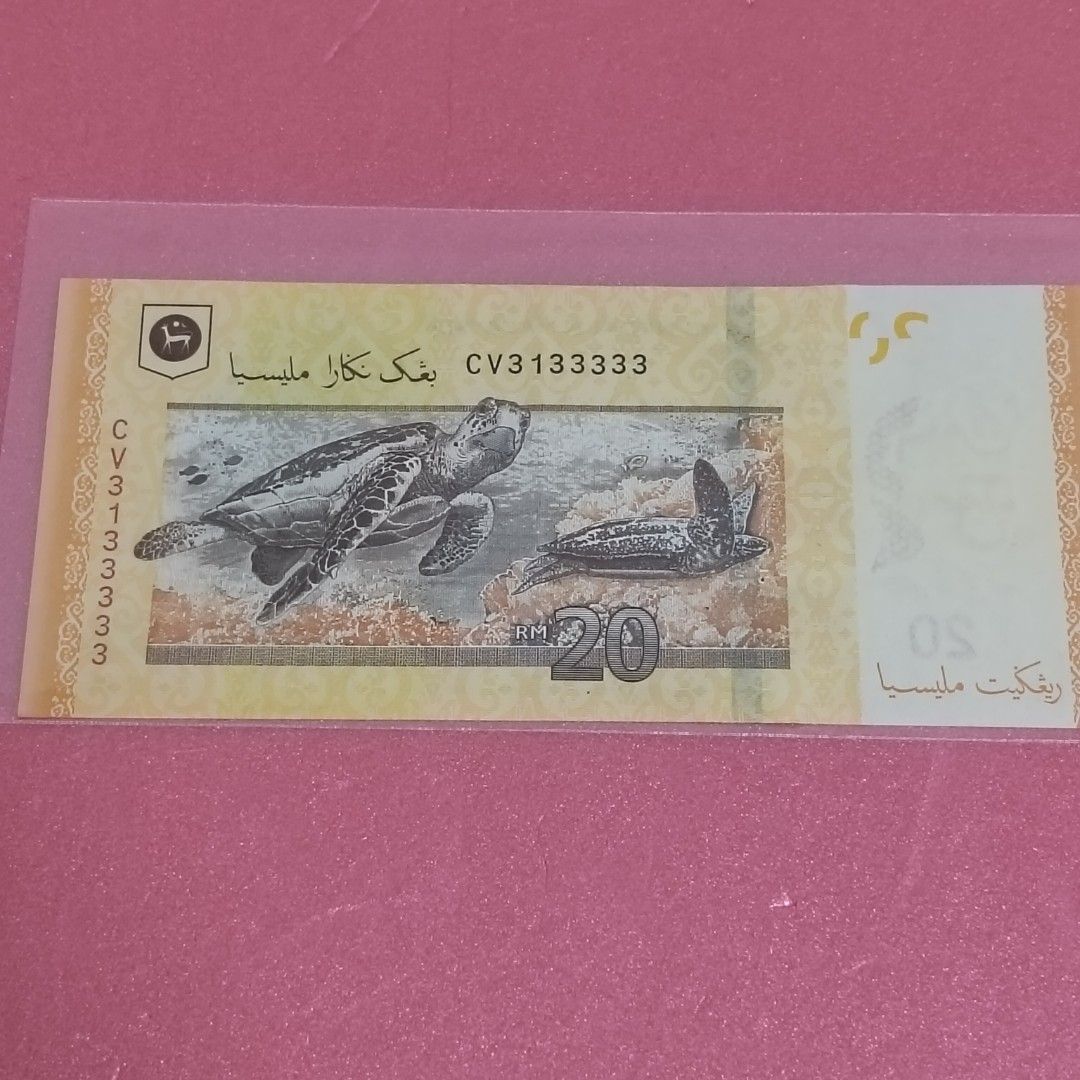 Rm20 almost solid 3 #3133333# (Category: Currency) located in Kota Kinabalu. Submitted by topmngt (Listing ID 1457084457, Image 2). Description: Rm20 14th series banknote with almost solid 3 . Serial number CV3133333. condition please refer to photo..