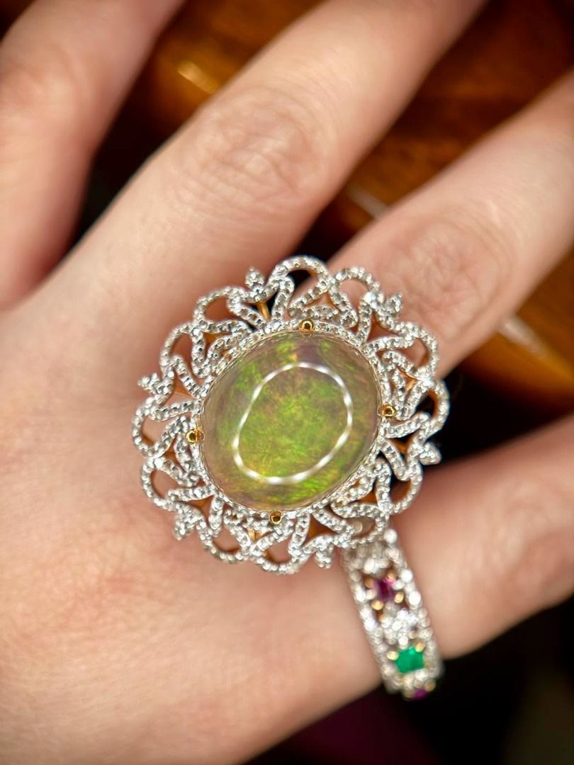 S7 Natural Ethiopian Opal & Diamond Ring (Category: Rings) located in Baguio. Submitted by asna_taku (Listing ID 1457027819, Image 1). Description: ✨ Natural Ethiopian Opal & Diamond Ring ✨ A dreamy Natural Ethiopian Opal with beautiful play-of-color — a statement piece for the gemstone lover. 💚✨ 💎 Natural Opal — 7.72 cts 🌈 Oval cabochon with natural play-of-color 💎 Accented with natural round-cut diamonds, approx. 0.75 ct total ✨ S925 Silver