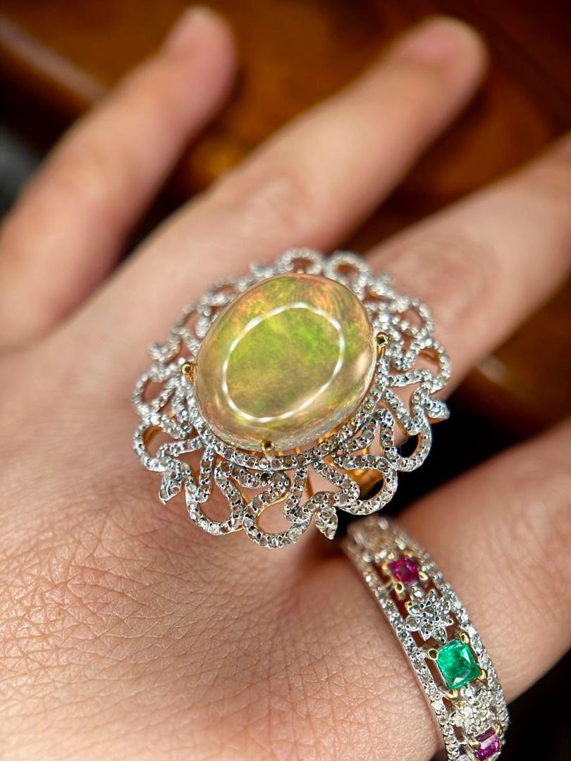 S7 Natural Ethiopian Opal & Diamond Ring (Category: Rings) located in Baguio. Submitted by asna_taku (Listing ID 1457027819, Image 2). Description: ✨ Natural Ethiopian Opal & Diamond Ring ✨ A dreamy Natural Ethiopian Opal with beautiful play-of-color — a statement piece for the gemstone lover. 💚✨ 💎 Natural Opal — 7.72 cts 🌈 Oval cabochon with natural play-of-color 💎 Accented with natural round-cut diamonds, approx. 0.75 ct total ✨ S925 Silver