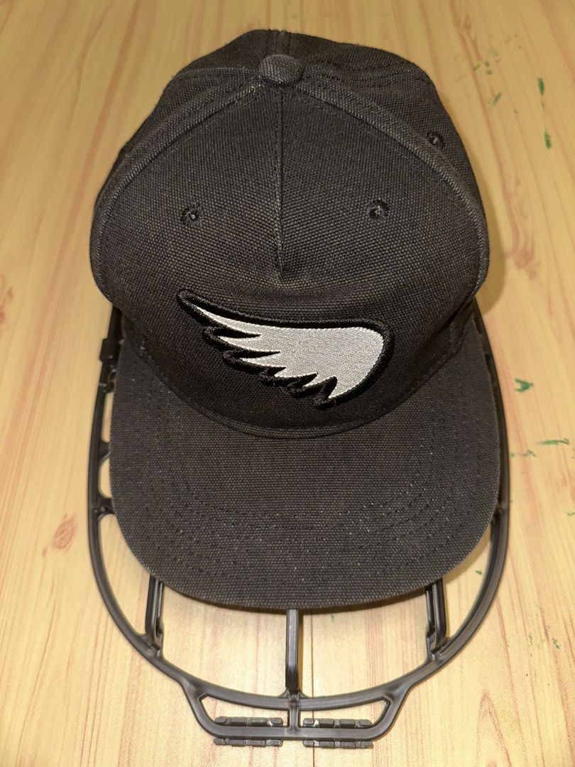 SAINT Black Baseball Cap with Wing Logo (Category: Caps & Hats) located in Quezon City. Submitted by mancave_stuff (Listing ID 1456971212, Image 1). Description: - Black baseball cap from SAINT - Features signature embroidered wing logo on the front - Inner lining with repeating SAINT logo pattern - Adjustable strap at the back for a customized fit - Ideal for everyday Moto wear.