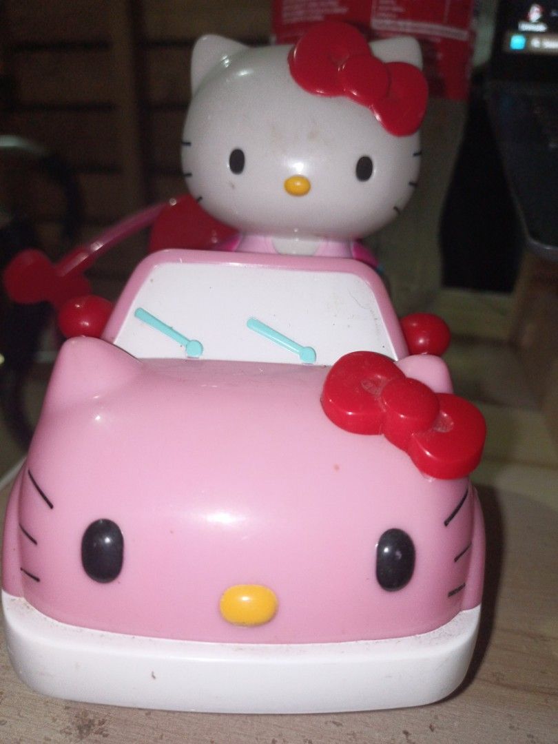 Sanrio Hello Kitty Remote Control Convertible (Category: Remote Control Toys) located in Olongapo. Submitted by mamirose1974 (Listing ID 1457065871, Image 2). Description: Jada Toys Hello Kitty IRC Single Drive Convertible (Remote Control Car) Pink Hello Kitty remote-control convertible with an attached Hello Kitty figurine "driving" the car. Comes with matching heart-button RC remote. Great collectible or play piece for Hello Kitty/Sanrio fans. 