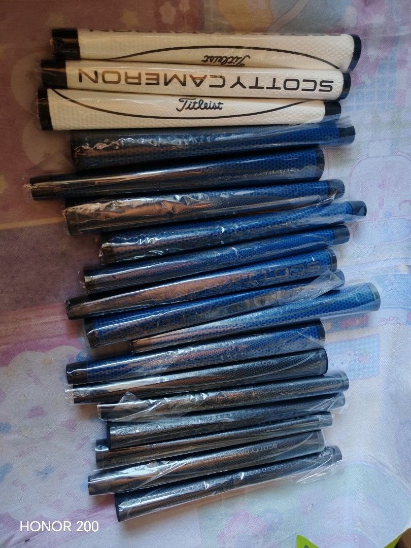 Scotty Cameron & Titleist Golf Grips (Category: Golf) located in Manila. Submitted by mariceloch01539 (Listing ID 1457027892, Image 3). Description: - 19pcs Bundle of Scotty Cameron and Titleist golf grips - Includes Studio Design models - Colors: White, Blue, Black - Perfect for upgrading your putter.