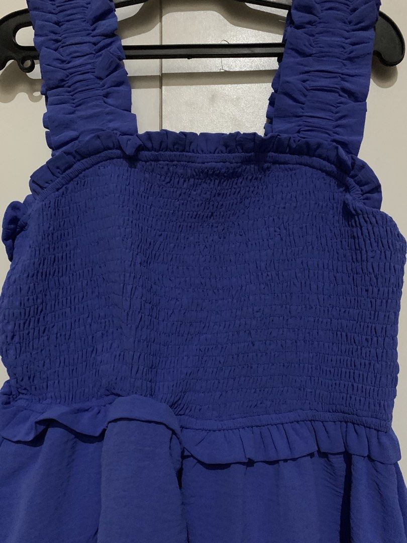 Smocked Ruffle Strap Peplum Top (Category: Sleeveless) located in Manila. Submitted by _wtfrn (Listing ID 1457086725, Image 3). Description: Selling my preloved but well loved clothes🎀 📌Blue flowy peplum hem top creating flattering silhouette feature 📌Size: S-M 📌Once used (no flaws) 📌Color may vary due to lightning 📍Quezon City 🛵Lalamove & Meet up nearby 💌: message me if your interested and will give you discounts🤗 .