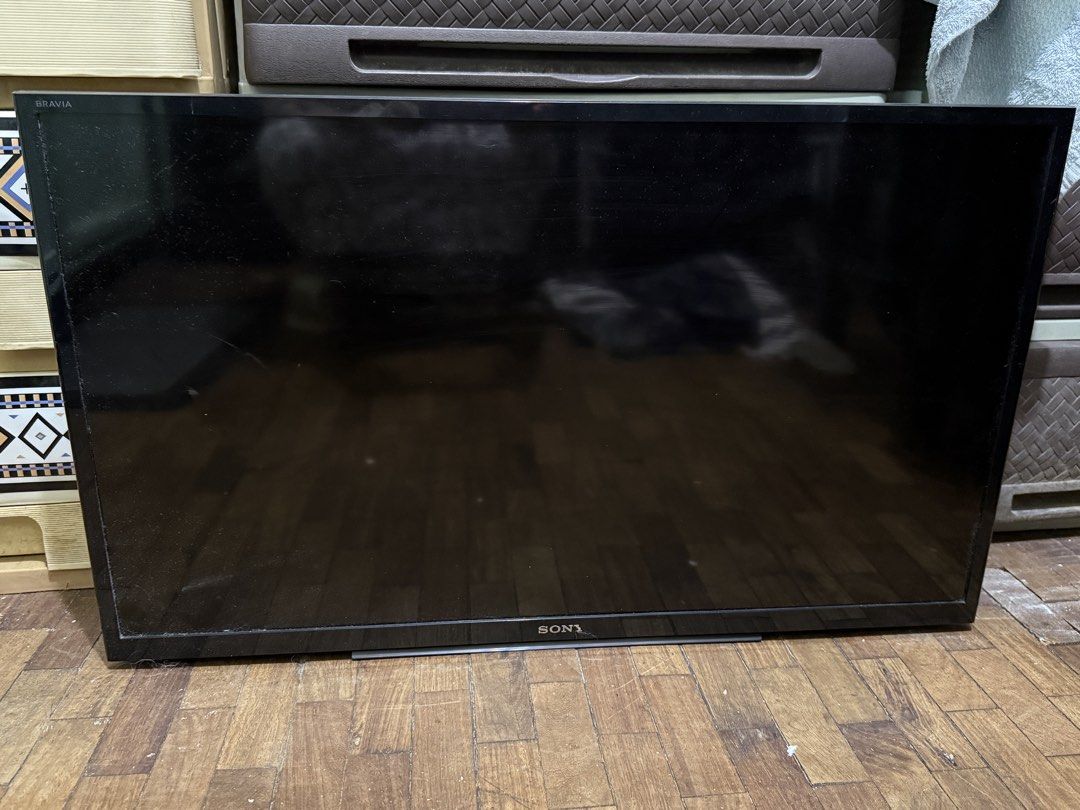 Sony Bravia TV (Category: TV) located in Manila. Submitted by gooddealsmanila (Listing ID 1457052886, Image 1). Description: - Sony Bravia Television - Screen is black - Minor dust and scratches on screen and bezel - Includes stand - Fully functional.
