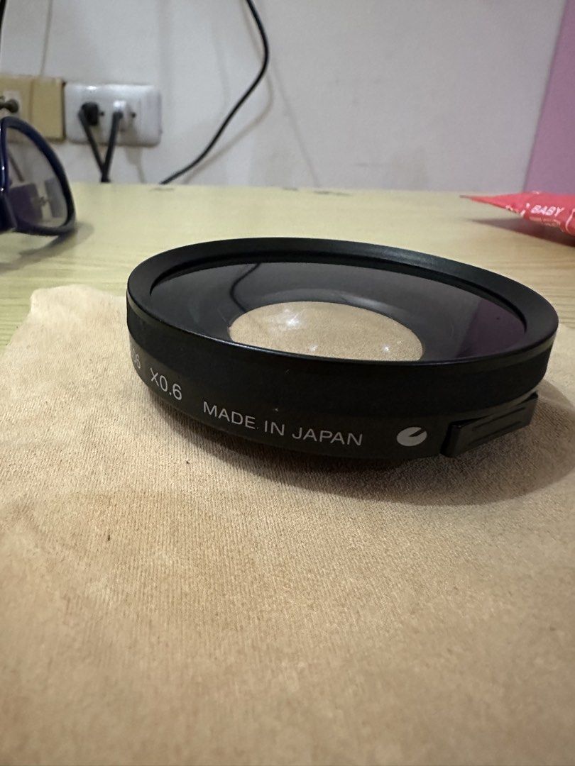 Sony VCL-ES06 X0.6 Wide Conversion Lens (Category: Lens & Kits) located in Daet. Submitted by thrifthings2018 (Listing ID 1457093898, Image 3). Description: - Sony VCL-ES06 Wide Conversion Lens - 0.6x magnification - Made in Japan - One-touch wide converter - Expands your camera's field of view - Minor dust on lens element.