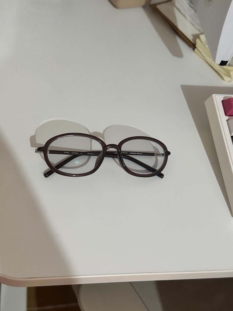 Sunnies Optical ARDEN Cortado (Category: Sunglasses & Eyewear) located in Manila. Submitted by rizmnl (Listing ID 1457139408, Image 3). Description: Frame: Arden Color: Cortado Bought for almost 5k RFS: will buy another frame from them too. Doesn’t really fit my face shape ✅Can replace the lenses ✅Has anti rad and photochromic. (Screen+sun safe) ✅PM me so we can check If we have the same grade..