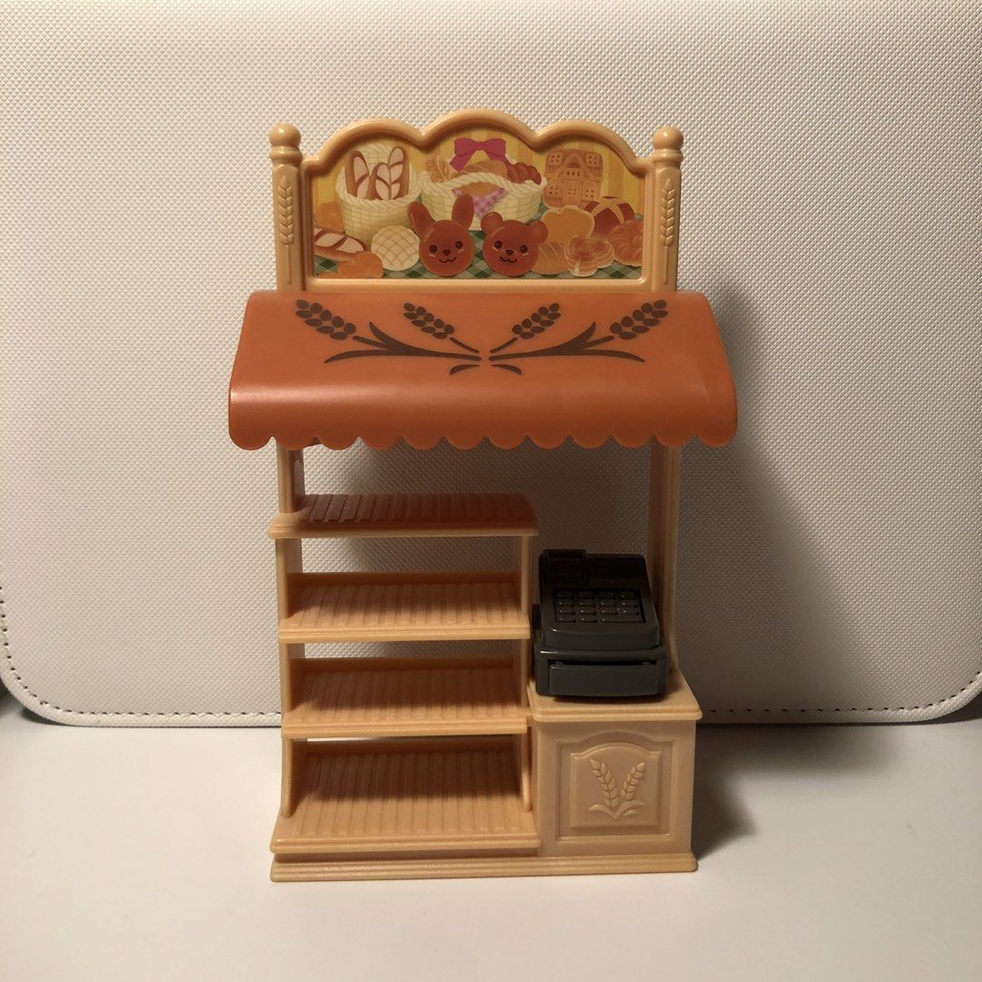Sylvanian Families - store shelf display rack (Category: Kids Toys) located in Bacoor. Submitted by silversharkcoll (Listing ID 1457135488, Image 1). Description: Sylvanian Families - store shelf display rack from bakery starter set make offer/dm to purchase — mop: gcash, maya, bpi shipping : j&t, ggx, lbc, sdd (lalamove/grab).