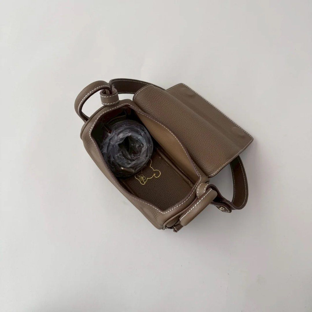 Tan Taupe mini treasure 18 (Category: Shoulder Bags) located in Manila. Submitted by berrnnee (Listing ID 1457035554, Image 2). Description: Mini treasure tan taupe 18 bag, slightly used. Slightly nego. Pm for actual pics..