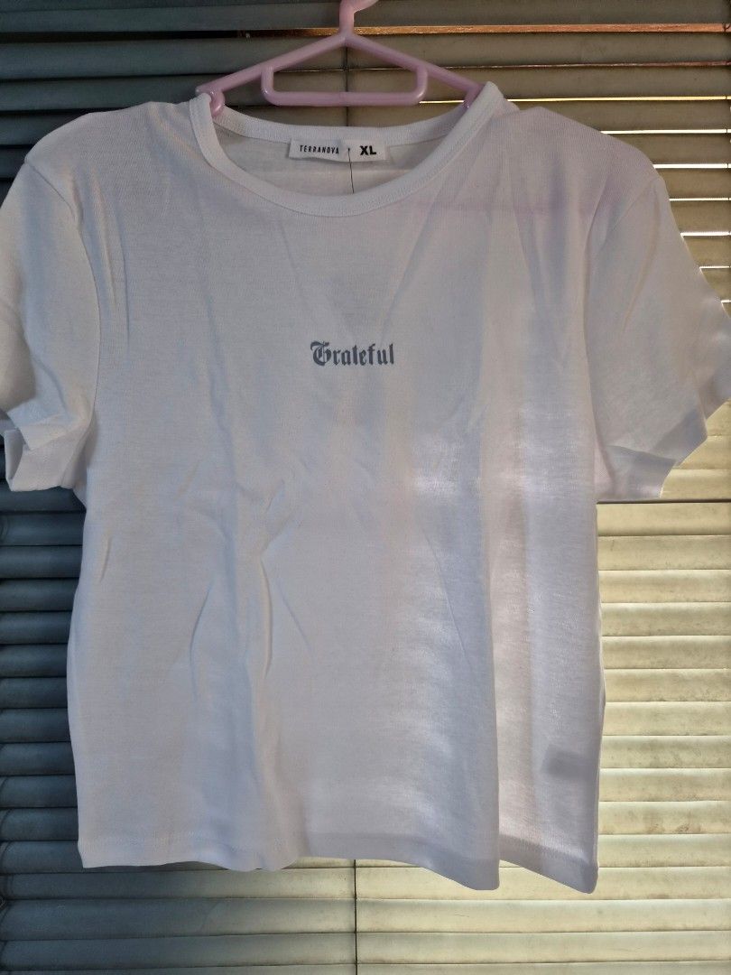 Terranova Crop Top Shirt (Category: Shirts) located in Makati City. Submitted by meowingfan (Listing ID 1457090870, Image 1). Description: Size XL. Size is too small, perfectly fit for S to M frame. White with back design. bought online sa website nila during sale. MOP: PAYO via Gcash, Maya,Go Tyme, Maribank, Landbank, BPI MOD: every weekend shipping via JNT.