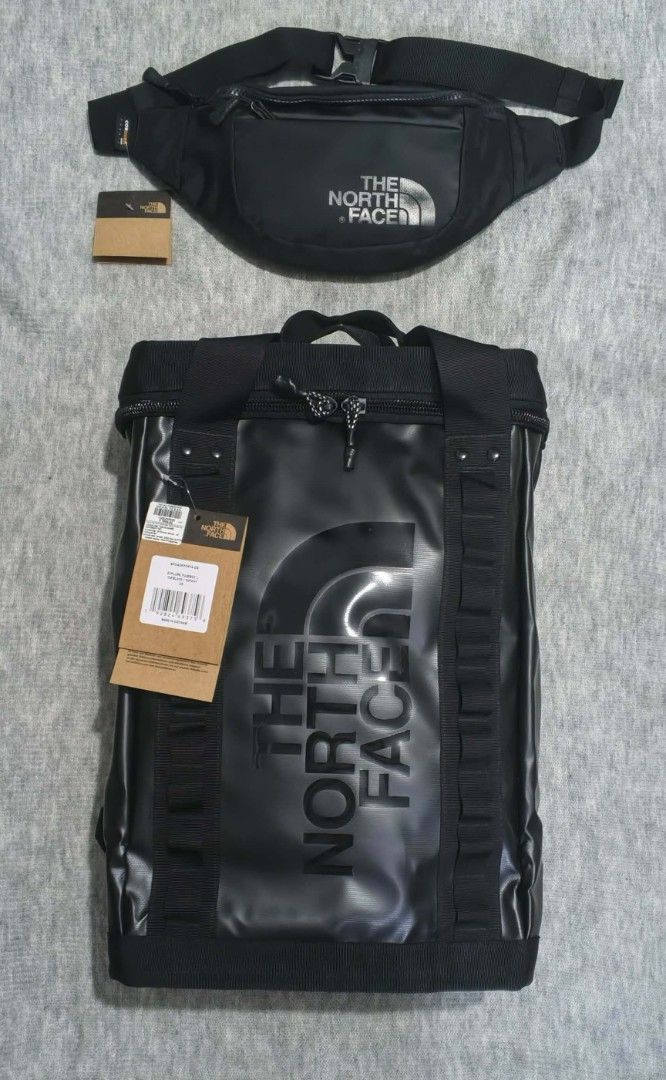 The North Face Black Backpack & Waist Bag Set (Category: Backpacks) located in Quezon City. Submitted by thirdeedimesiv (Listing ID 1457069626, Image 1). Description: - Set includes: The North Face Fusebox explore backpack with freebie waist/fannypack bag. - Both items feature the iconic The North Face logo. - Backpack can fit upto 14" laptop and slim tall water bottles (e.g., Contigo/Aquaflask) on its side pocket. - Versatile for everyday use, s