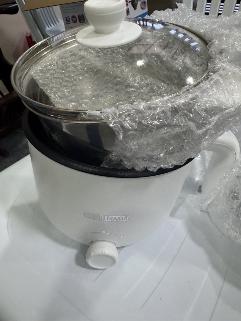 Tough Mama 1.5 multi - cook pot (Category: Cookers) located in Las Pinas. Submitted by vanethneth (Listing ID 1457104683, Image 3). Description: 1.5L capacity Tough Mama (NTM-MP15SS) Multipot 1.5L Multicooker Non-Stick Pot Electric Rice Cooker Hotpot Stainless steel body with non-stick coating Can cook noodles and soup Can do shabu-shabu and hotpot Can also steam food Adjustable temperature 600 watts.