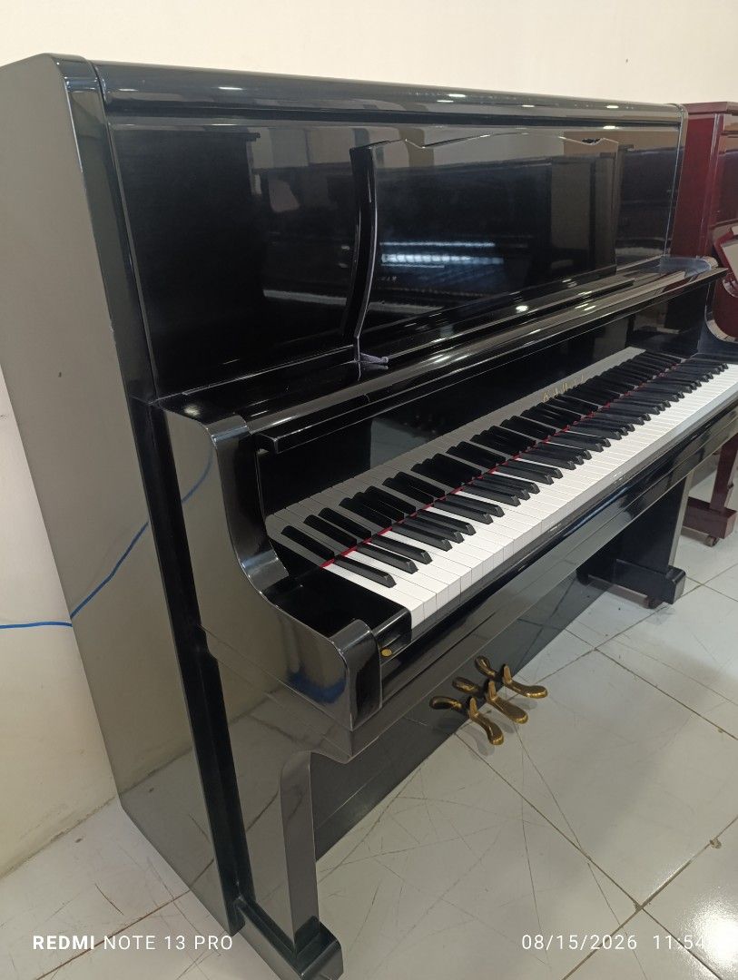 Upright piano (Category: Musical Instruments) located in Manila. Submitted by swiftstar.3eae19 (Listing ID 1456974529, Image 2). Description: Kawai KU-5 🎹 a 54 inch upright grand having a warm, mellow tone and rich bass..
