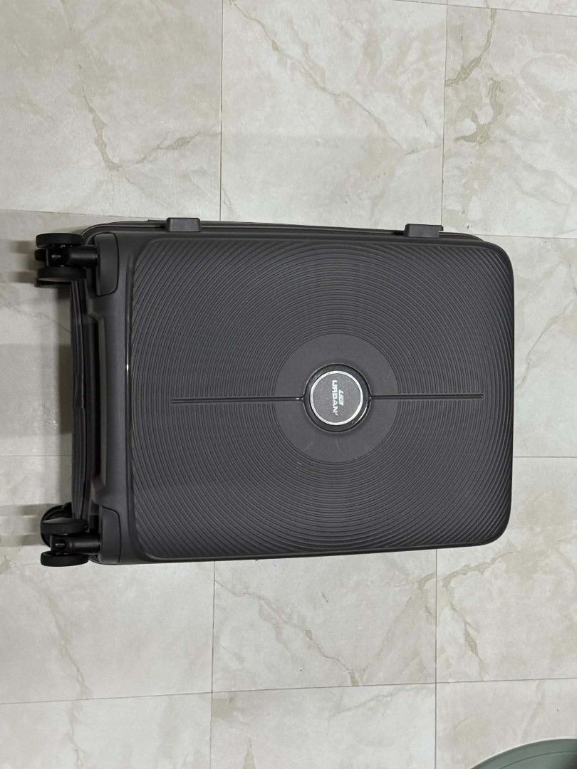 Urban Luggage (Category: Luggage) located in Taguig. Submitted by perfect_restyle (Listing ID 1457003980, Image 1). Description: - Brand: Urban Luggage - Size: 20" Cabin Size - Type: Hardcase - Color: Dark Gray - Features: Textured exterior for durability, organized interior with straps and zippered compartments, smooth-rolling wheels. - Ideal for: Weekend trips, business travel, carry-on. - Availability: Rapid Sell item. - Meetup locations: Glor