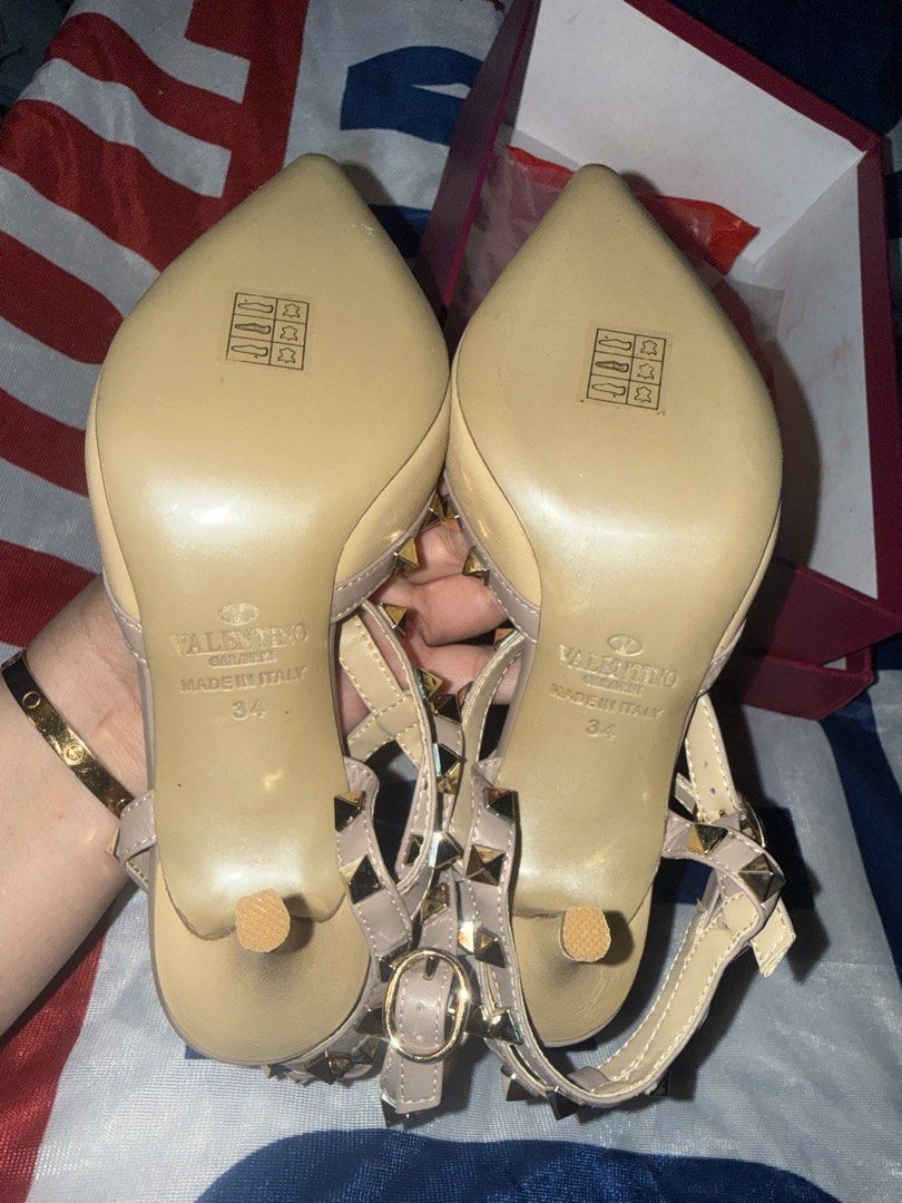 Valentino Rockstud Heels Size 34 (Category: Voice Recorders) located in Angeles City. Submitted by migs_font29 (Listing ID 1457054411, Image 2). Description: - Valentino Garavani heels - Color: Beige with gold studs - Style: Pointed toe, ankle strap closure - Origin: Made in Italy - Size: 34 - Includes original box.
