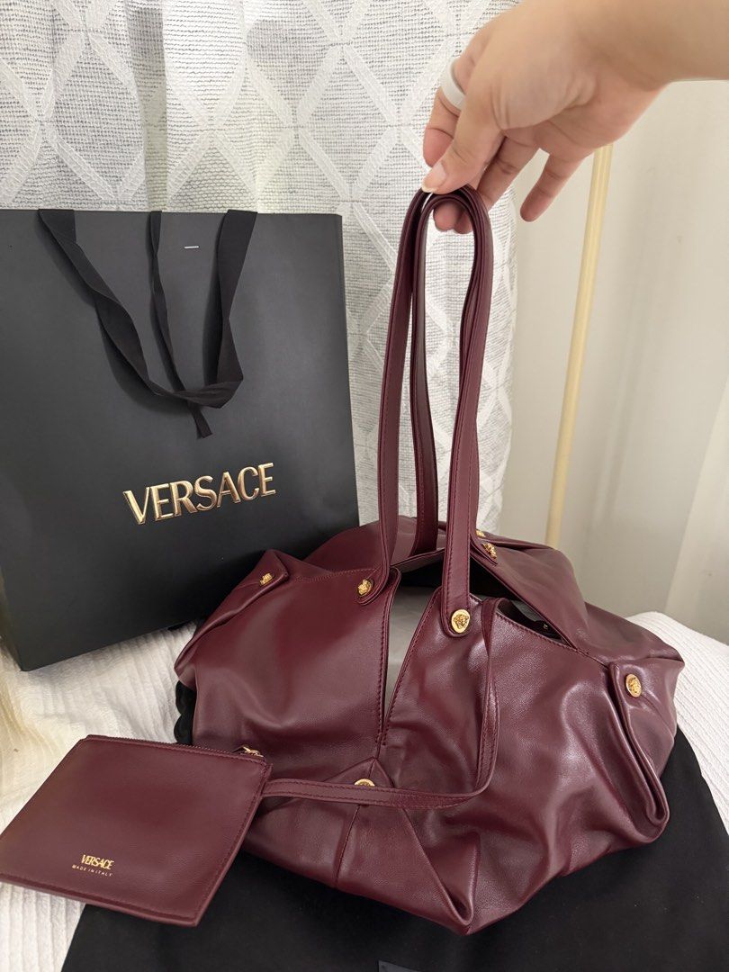 Versace Protea Bag (Category: Luxury Bags & Wallets) located in Las Pinas. Submitted by shopdeynuh (Listing ID 1456998728, Image 2). Description: Brand new, never worn. Perfect for gifting. Comes with dustbag, paperbag and cards. .