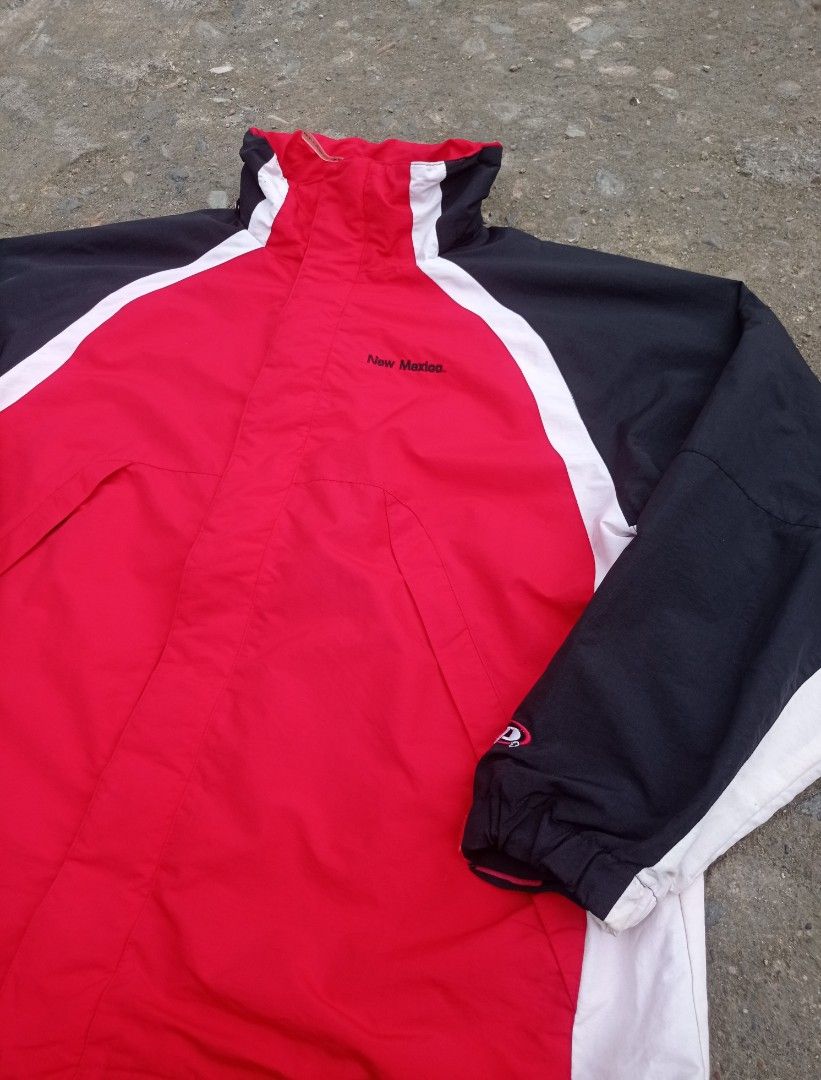 vintage New Mexico Lobos pro player windbreaker jacket (Category: Coats, Jackets and Outerwear) located in Guiguinto. Submitted by selected_3rp (Listing ID 1457084543, Image 3). Description: vintage New Mexico Lobos pro player windbreaker jacket red, black, and white colorblock design and a large wolf logo patch on the back. size XL issue missing hood excellent condition pm.
