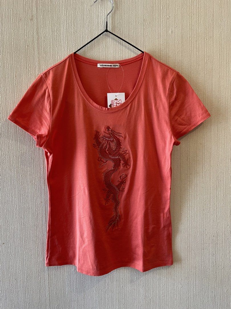 Vivienne Tam Embroid Dragon T-shirt (Category: Shirts) located in Agoo. Submitted by omaethrift (Listing ID 1456975277, Image 1). Description: - Vivienne Tam t-shirt blouse - Size 0 - 100% Cotton - Embroidered dragon design - Short sleeves - Easy care (refer to tag) - A unique and stylish wardrobe essential!.
