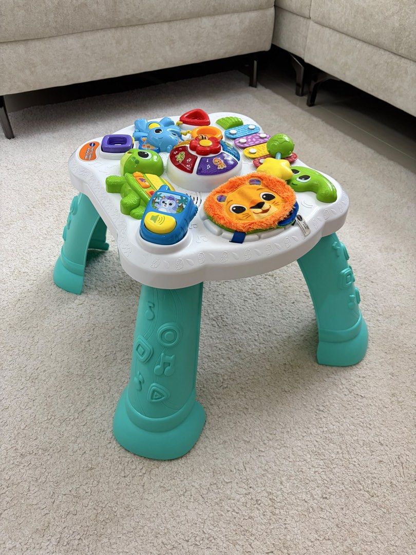 VTech Touch & Explore Activity Table (Category: Infant Playtime) located in Kuala Lumpur. Submitted by girlsellswhat (Listing ID 1457115417, Image 1). Description: Selling cheap! Bought at RM150. No box. - Fun VTech activity table for little ones. - Interactive elements: phone, shape sorter, fabric page. - Teaches fruits, colors, and numbers. - Promotes playtime and development. - Detachable legs for versatile floor play..