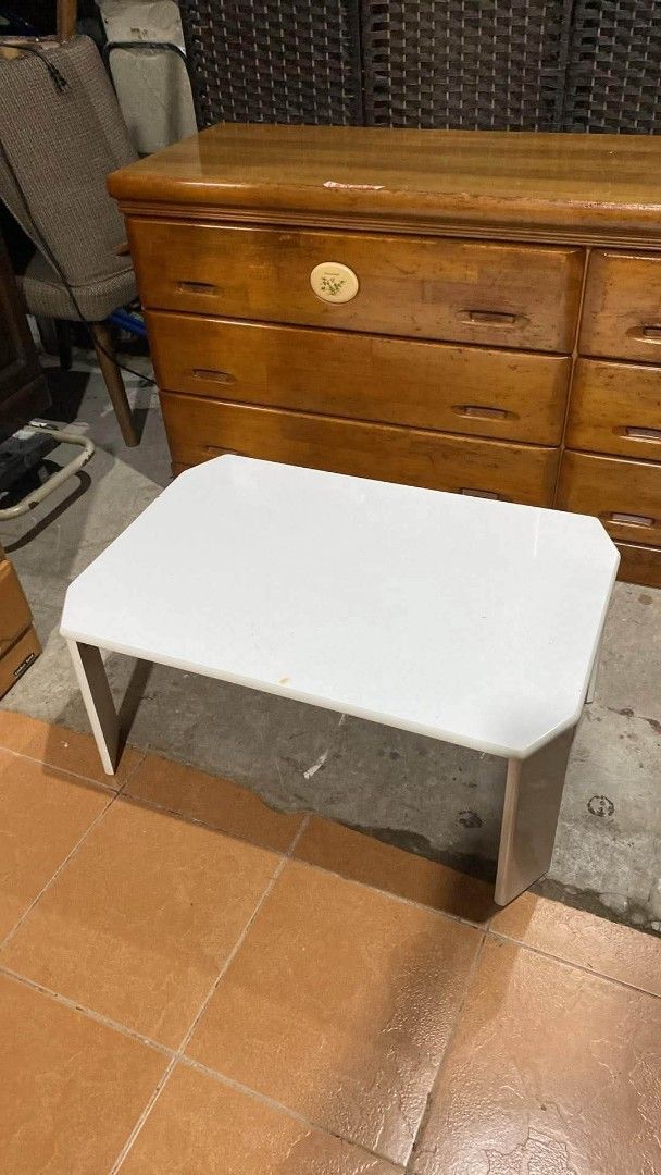 White Folding Table (Category: Tables & Sets) located in Quezon City. Submitted by dannikkishoppe2 (Listing ID 1457080056, Image 3). Description: White Folding Table ‼️₱2800‼️ L29.5 W20 H12.5 inches *foldable legs Please manage your expectations as there might be minimal flaws. Color may vary due to lighting, it may appear darker or lighter in person. Check photos first before buying. Please refrain from purchasing if you are particular about USE