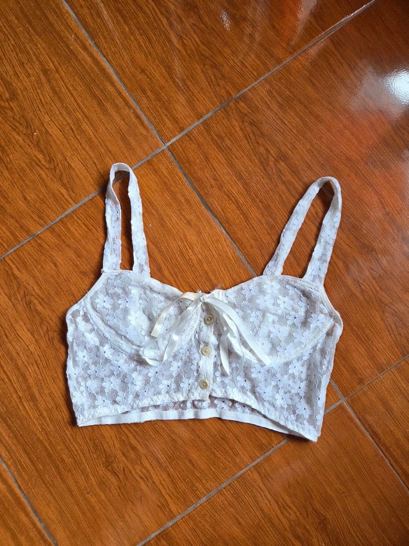 White Lace Lingerie (Category: Undergarments & Loungewear) located in Manila. Submitted by declutterwtly (Listing ID 1425392692, Image 3). Description: Send me your offers, TYSM! ♡ -Delicate white laced lingerie -Features adjustable straps and a front closure with buttons and a ribbon. -The bra has a floral lace pattern -Seethrough.