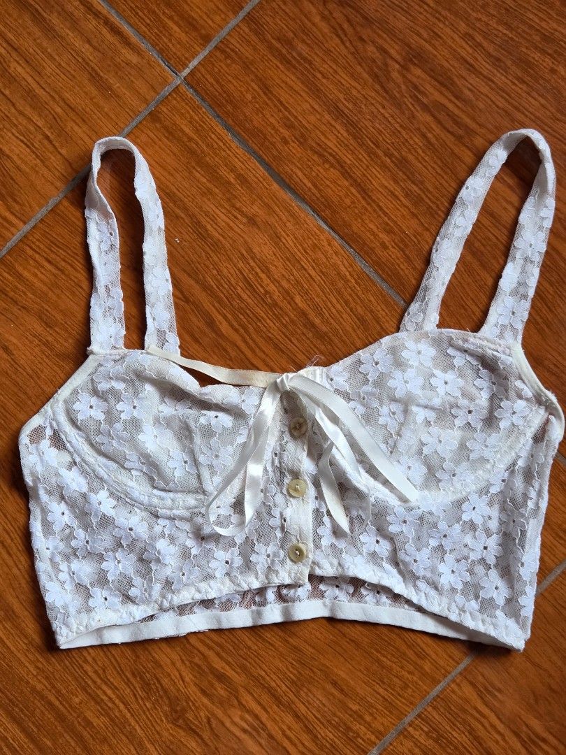 White Lace Lingerie (Category: Undergarments & Loungewear) located in Manila. Submitted by declutterwtly (Listing ID 1425392692, Image 2). Description: Send me your offers, TYSM! ♡ -Delicate white laced lingerie -Features adjustable straps and a front closure with buttons and a ribbon. -The bra has a floral lace pattern -Seethrough.