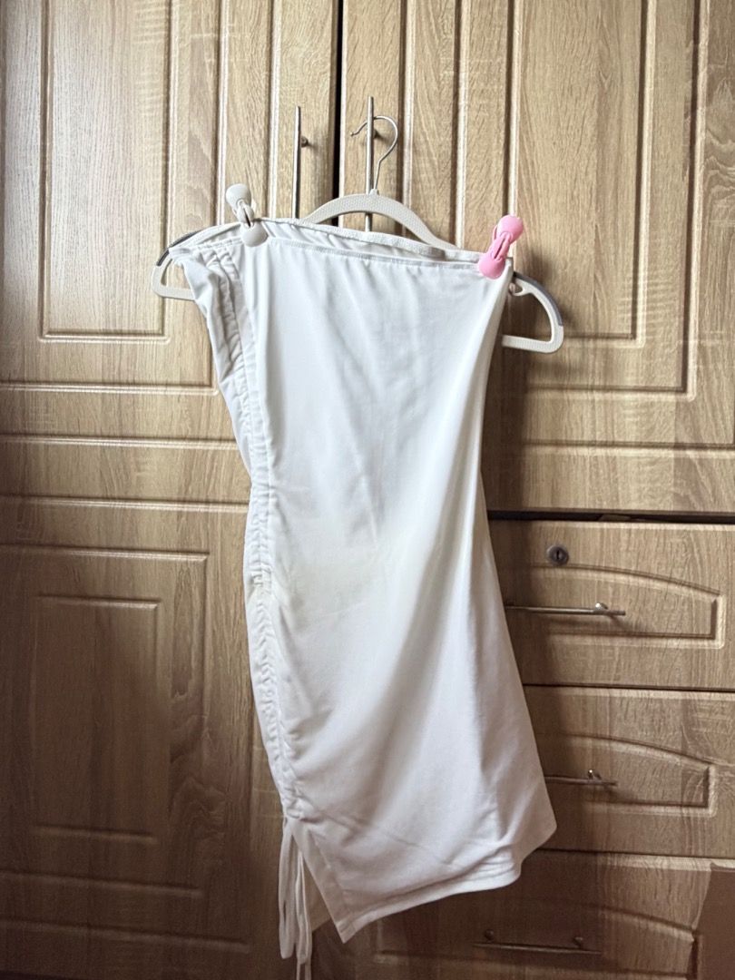 White Ruched Side Mini Dress with slit (Category: Dresses) located in Tanza. Submitted by kmoarse (Listing ID 1456968896, Image 2). Description: - White mini dress - Features ruched detailing on the side with a drawstring for adjustable fit - Sleeveless design - Versatile for night outs or casual wear - Easily pairs with heels or sneakers - With slit - Used once .