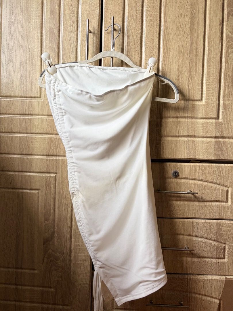 White Ruched Side Mini Dress with slit (Category: Dresses) located in Tanza. Submitted by kmoarse (Listing ID 1456968896, Image 3). Description: - White mini dress - Features ruched detailing on the side with a drawstring for adjustable fit - Sleeveless design - Versatile for night outs or casual wear - Easily pairs with heels or sneakers - With slit - Used once .