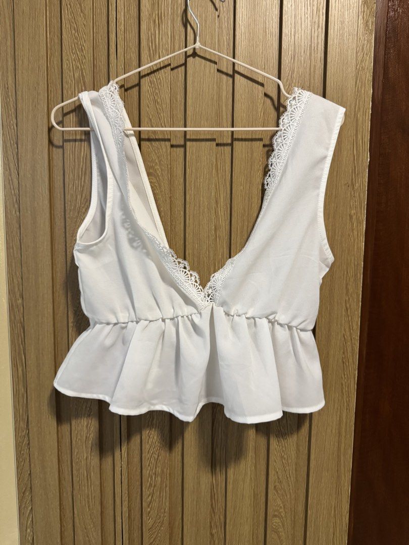 White Sleeveless Boho Top (Category: Sleeveless) located in Paranaque City. Submitted by prelovedbye__ (Listing ID 1457082617, Image 1). Description: .