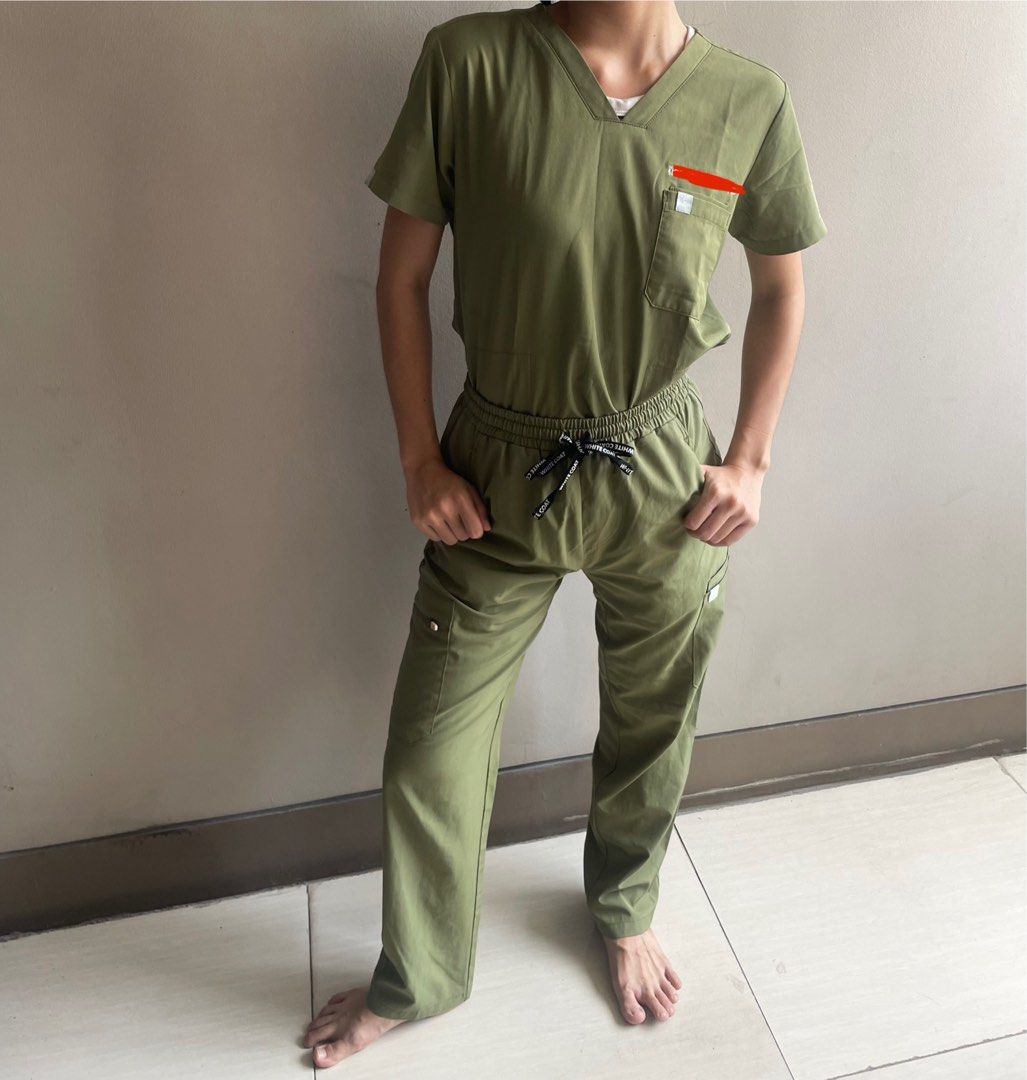 Whitecoat manila scrubs (Category: Sets or Coordinates) located in San Juan City. Submitted by prelovedstuff_01 (Listing ID 1457018334, Image 2). Description: With embroidery. Pa remove niyo na lang 🥹 Size small both top and pants. Love the color of this!!! 💚 not faded, no discoloration, no stains.